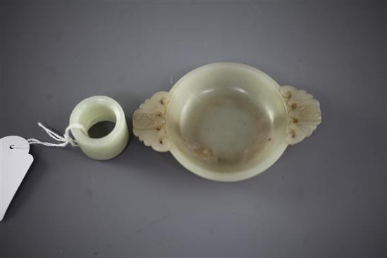 A Chinese pale celadon jade small brush washer and an archers ring, 2.7cm and 10.2cm